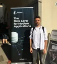 In front of the Prisma banner